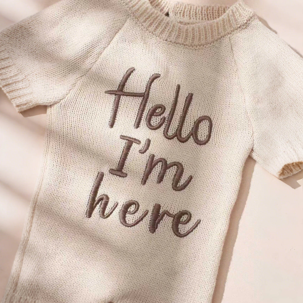 "Hello I’m Here” Newborn Onesie