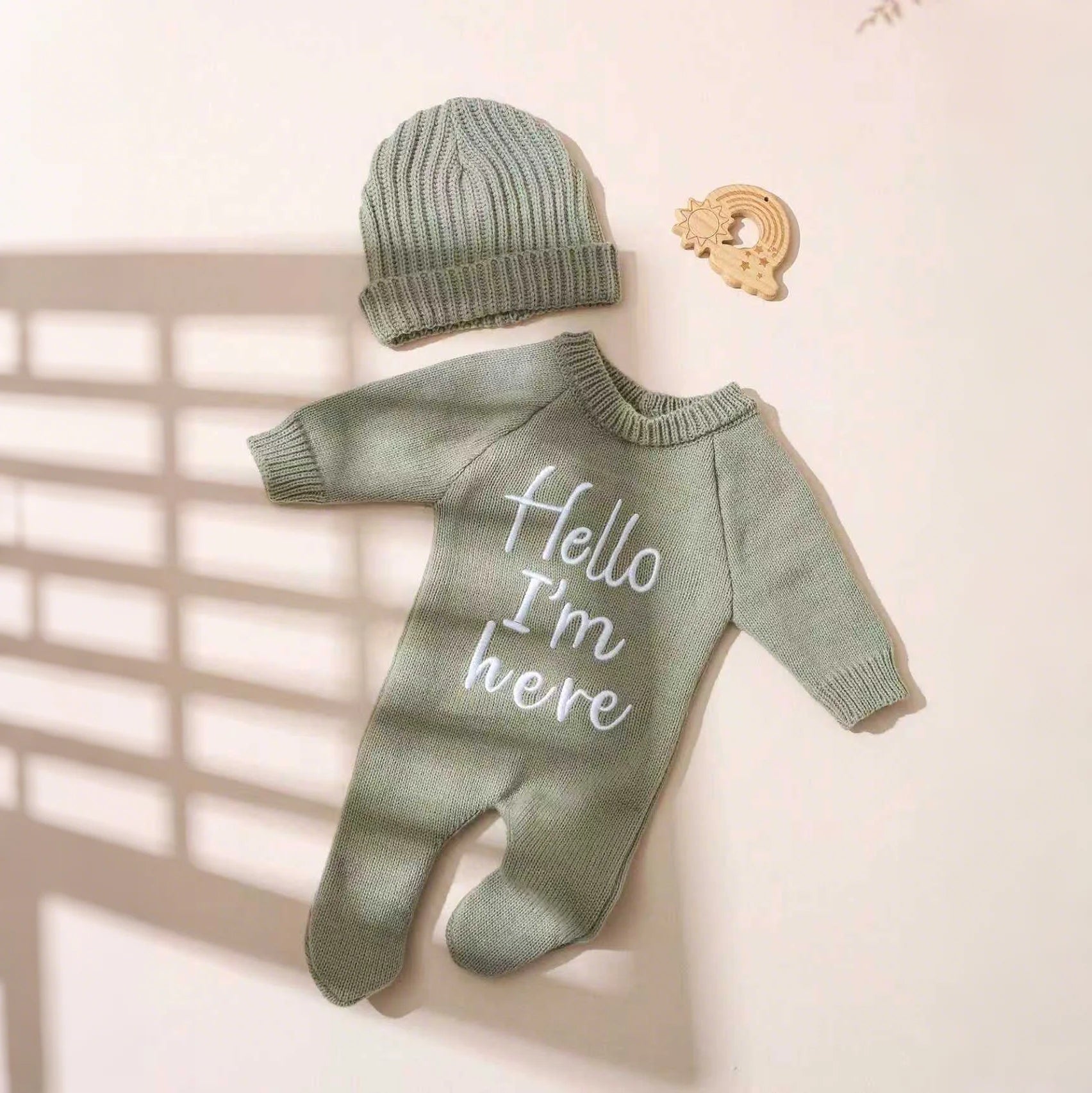 "Hello I’m Here” Newborn Onesie