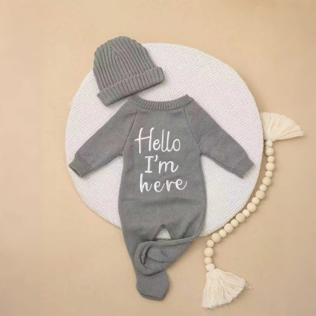 "Hello I’m Here” Newborn Onesie