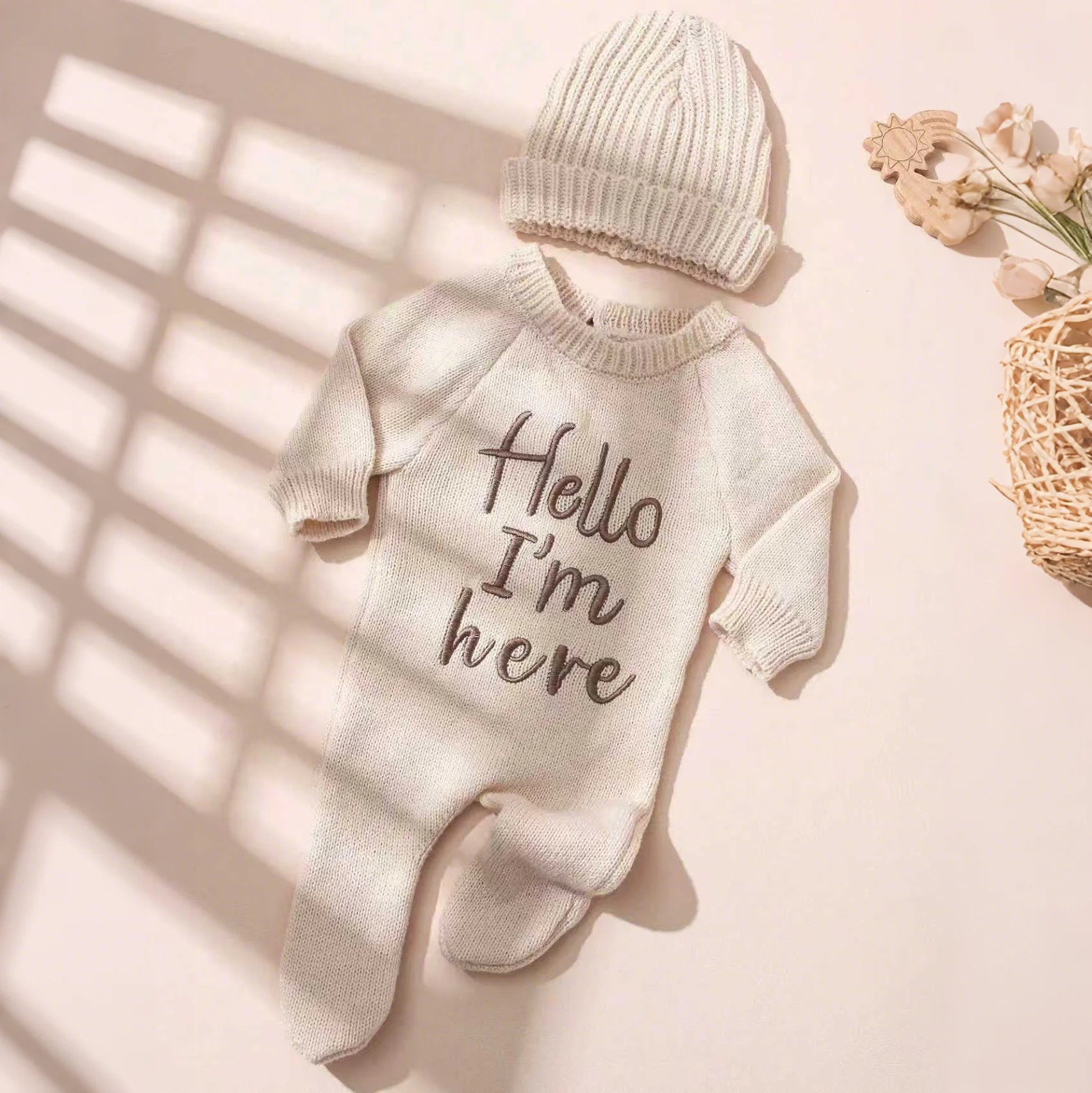 "Hello I’m Here” Newborn Onesie